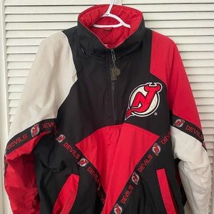 The devils Vintage original wind breaker, small but runs oversized